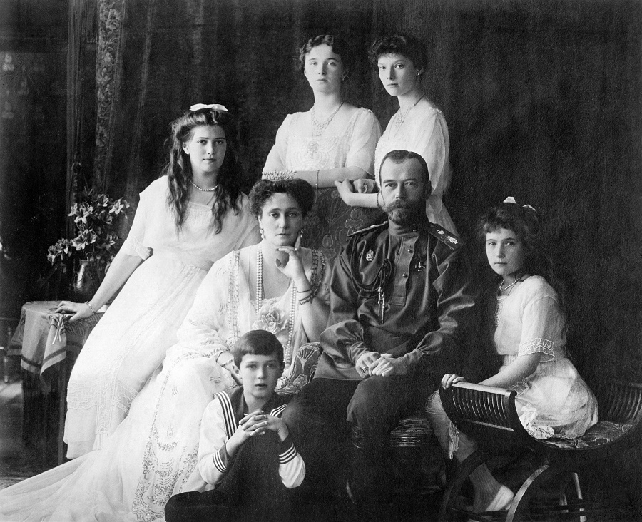 <Photo shows members of the Romanovs, the last royal family of Russia including: seated (left to right) Marie, Queen Alexandra, Czar Nicholas II, Anastasia, Alexei (front), and standing (left to right), Olga and Tatiana. (Source: Flickr Commons project, 2010)